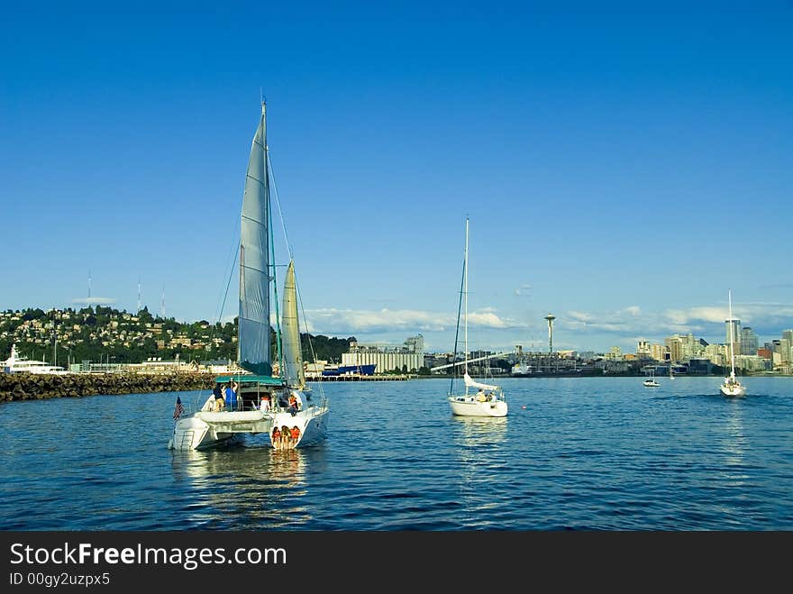 Sailboats on Elliott Bay in downtown Seattle, WA. Sailboats on Elliott Bay in downtown Seattle, WA