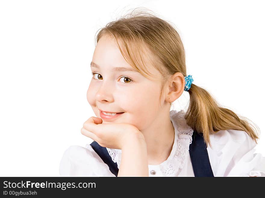 A smiling young girl in a dress