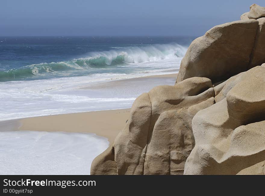 Rock formations sculpted by waves on Lovers' beach in Cabo San Lucas, Mexico.