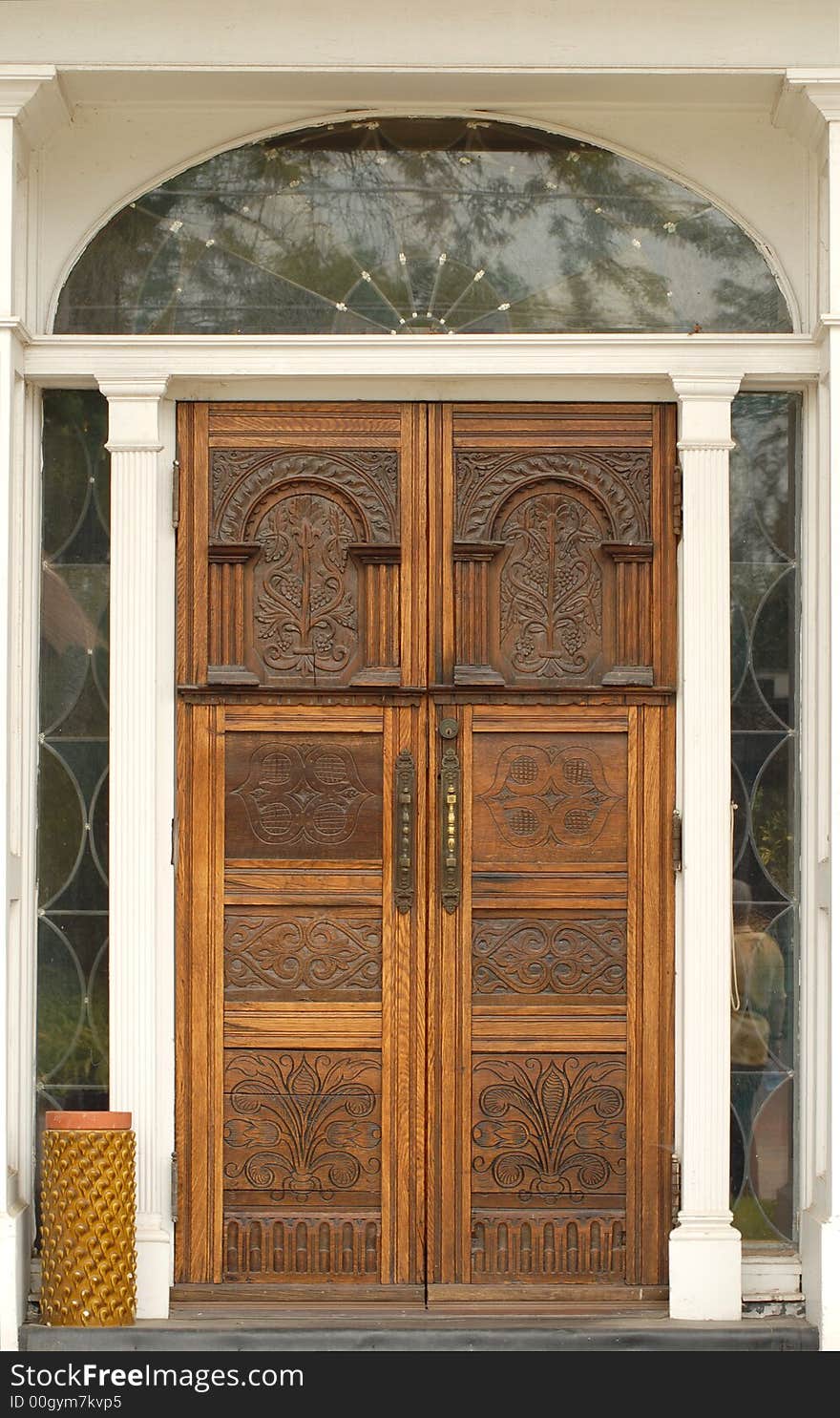 A building doorway with a weathered wooden door