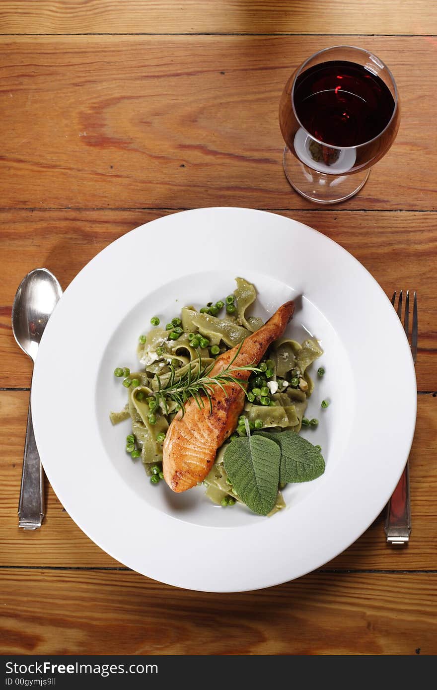 Salmon with wild garlic pasta and redwine