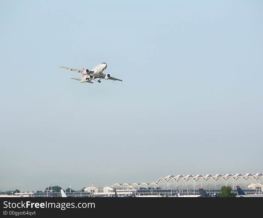 Commercial jet in flight just after takeoff from Reagan National Airport in Washington, DC. copy space included. Commercial jet in flight just after takeoff from Reagan National Airport in Washington, DC. copy space included