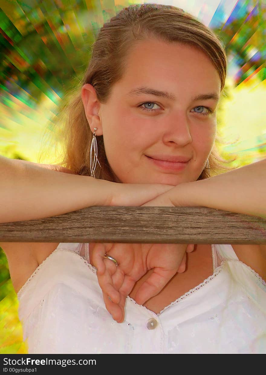 Teen posing by the hammock under a shade tree in June. Teen posing by the hammock under a shade tree in June