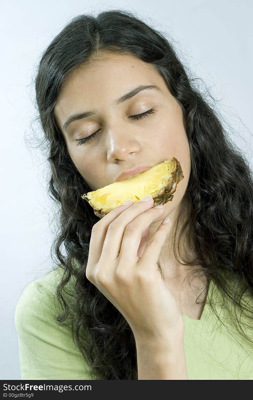 Girl Eating Pineapple