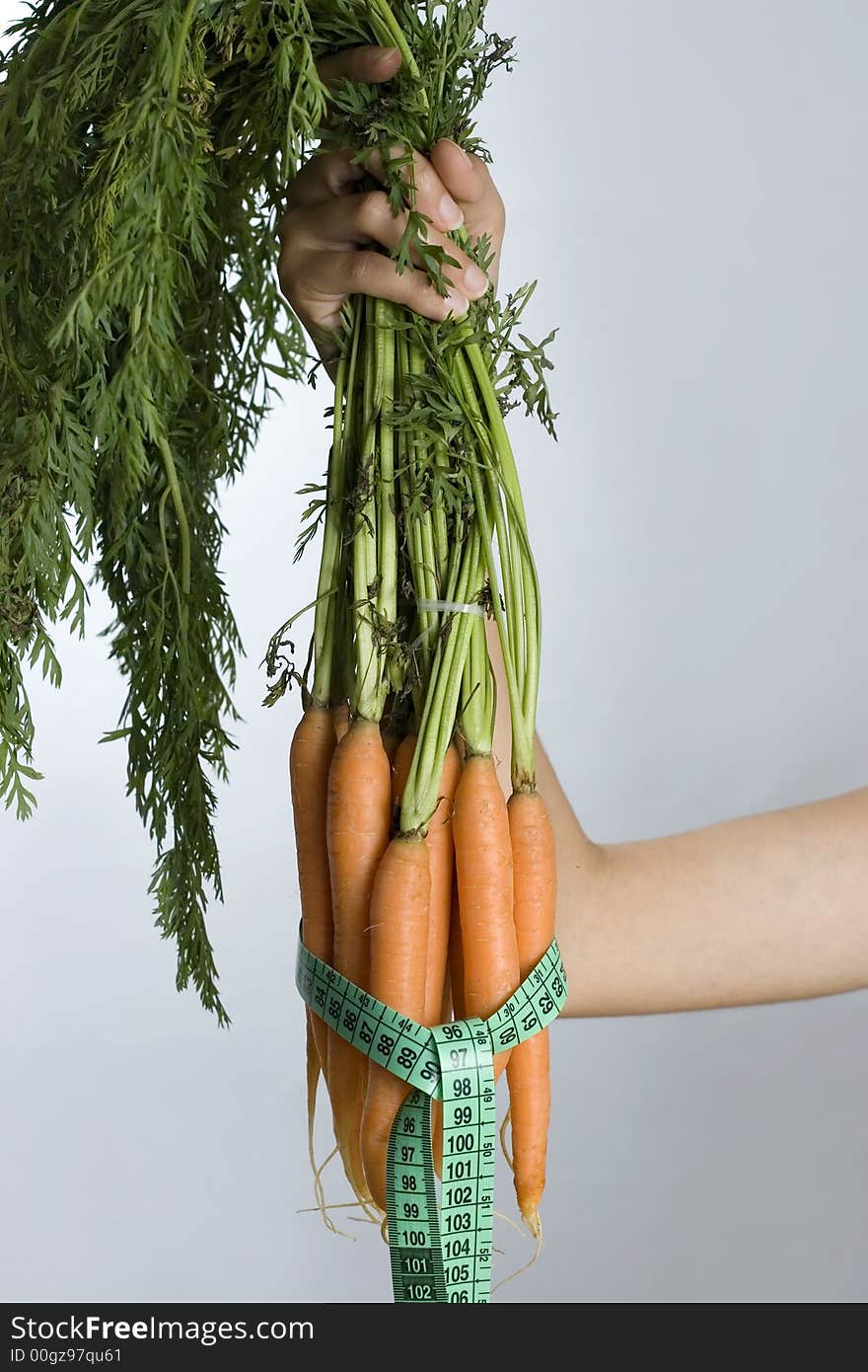 Carrots with measuring tape