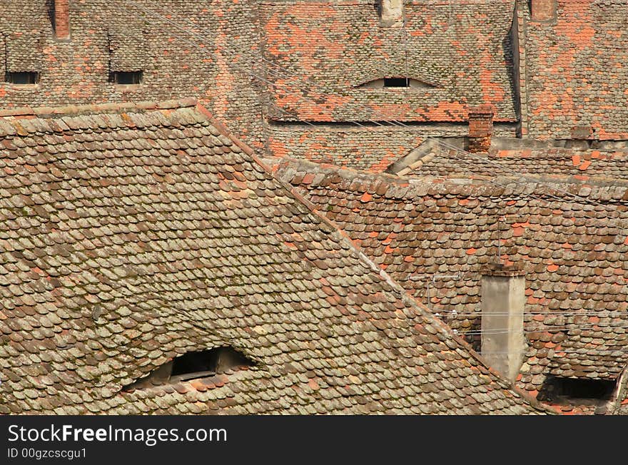 Abstract image generated by specific roofs .The place is located in Sibiu(Hermanstadt),Romania,a city which is during 2007 the European Cultural Capital.This group of images is a great source  of specific Romanian( European) landmarks from a hot place in 2007. Abstract image generated by specific roofs .The place is located in Sibiu(Hermanstadt),Romania,a city which is during 2007 the European Cultural Capital.This group of images is a great source  of specific Romanian( European) landmarks from a hot place in 2007.