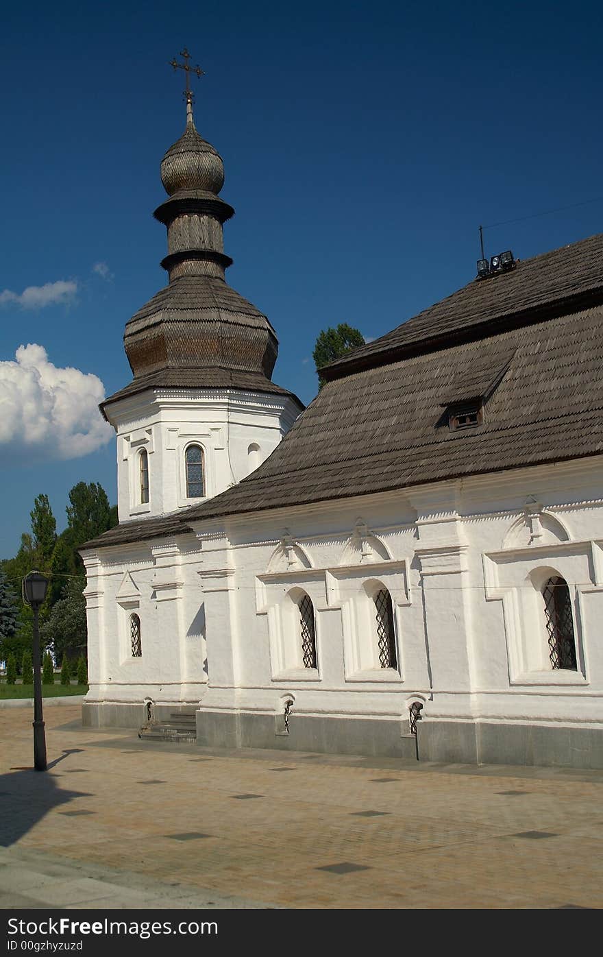 Old white church and deep blue sky