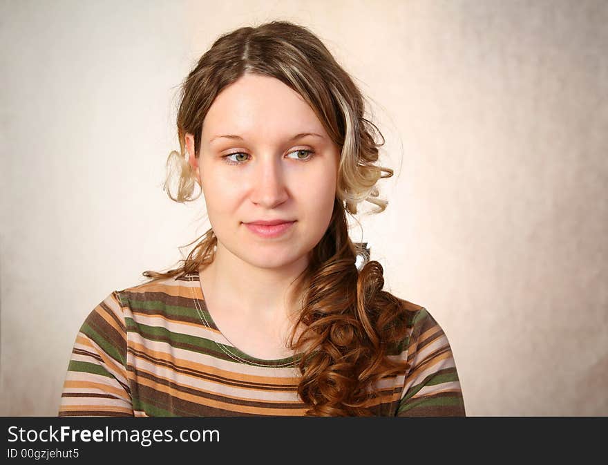 The thoughtful curly haired woman. The thoughtful curly haired woman