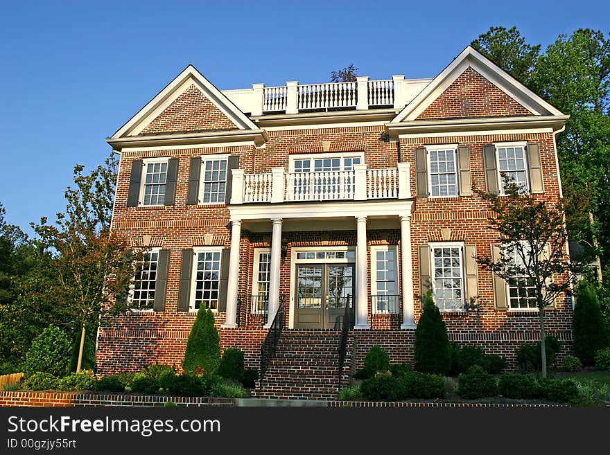 Brick Home In Morning Light