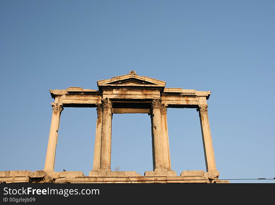 Hadrian's Arch beside the pillars of olympic zeus temple athens greece