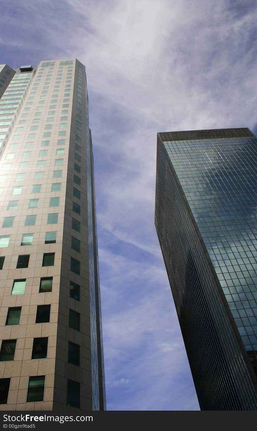 Two modern office buildings in daylight. Two modern office buildings in daylight