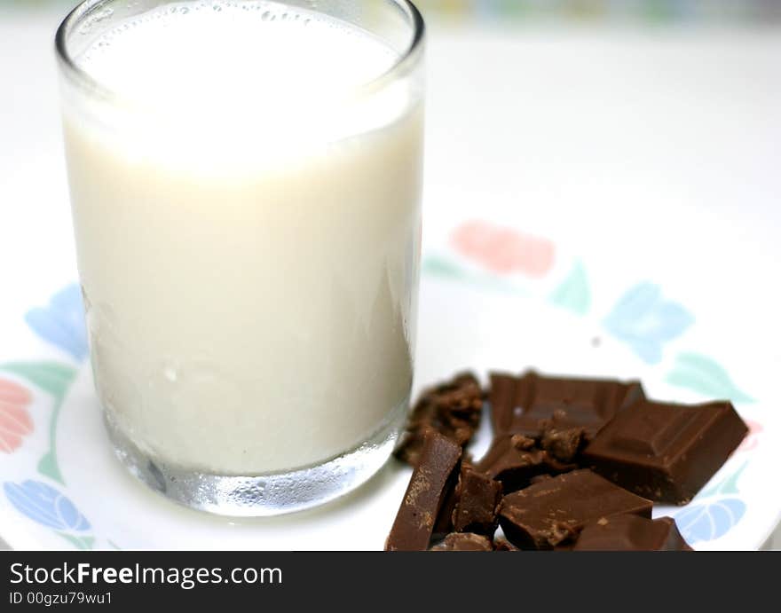 Milk and chocolate in a white background