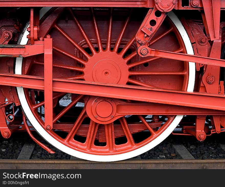 Red steam engine wheel and push rod. Red steam engine wheel and push rod