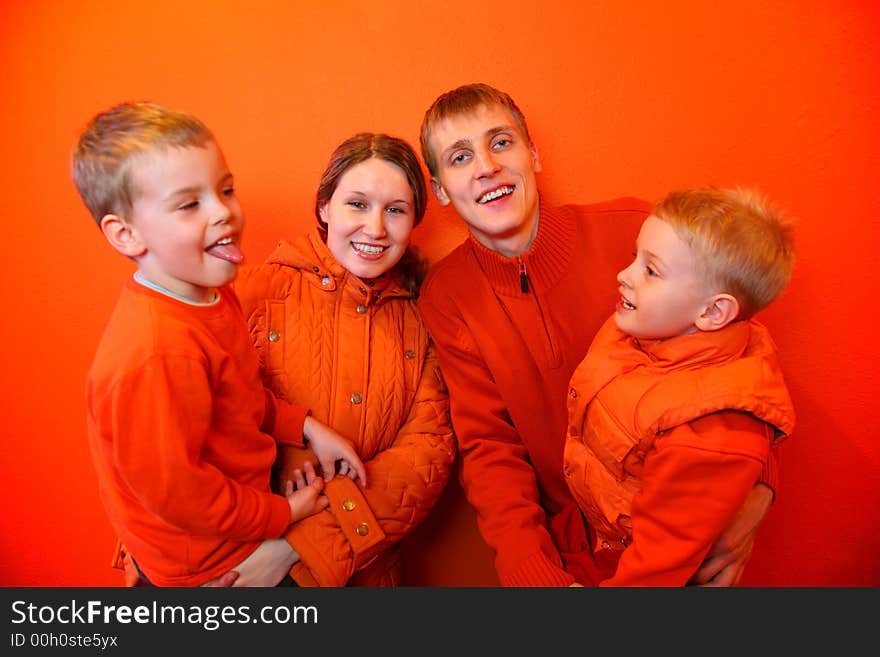 Family together on an red background. Family together on an red background