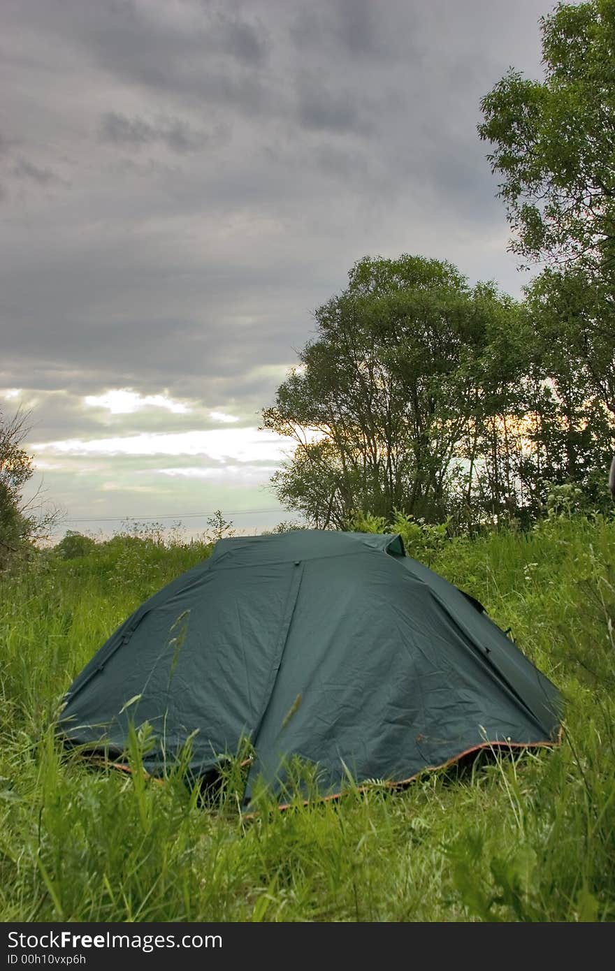 Tourist tent under morning sky