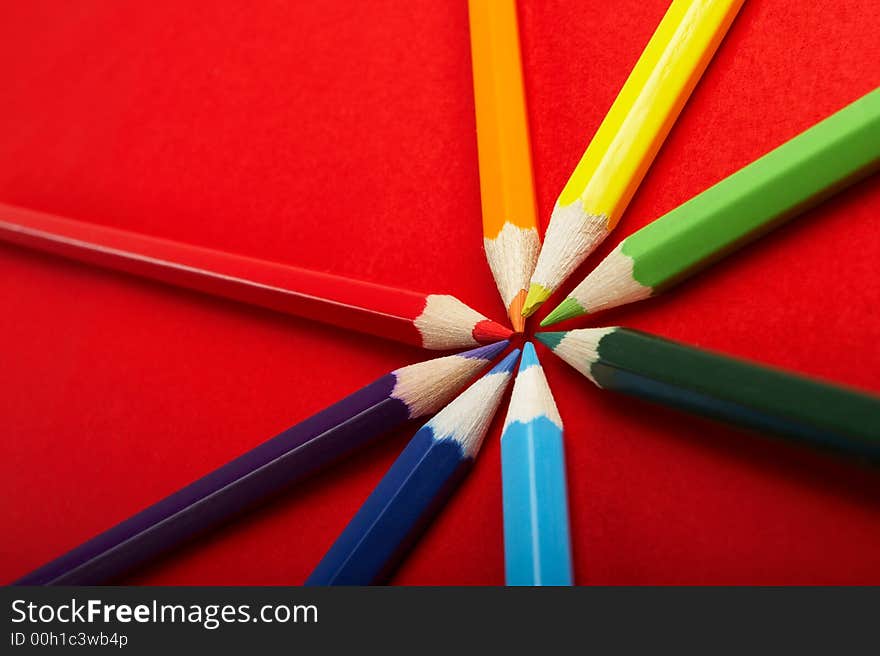 A Circle of Colored Pencils on Red Background - check my gallery for more pictures. A Circle of Colored Pencils on Red Background - check my gallery for more pictures