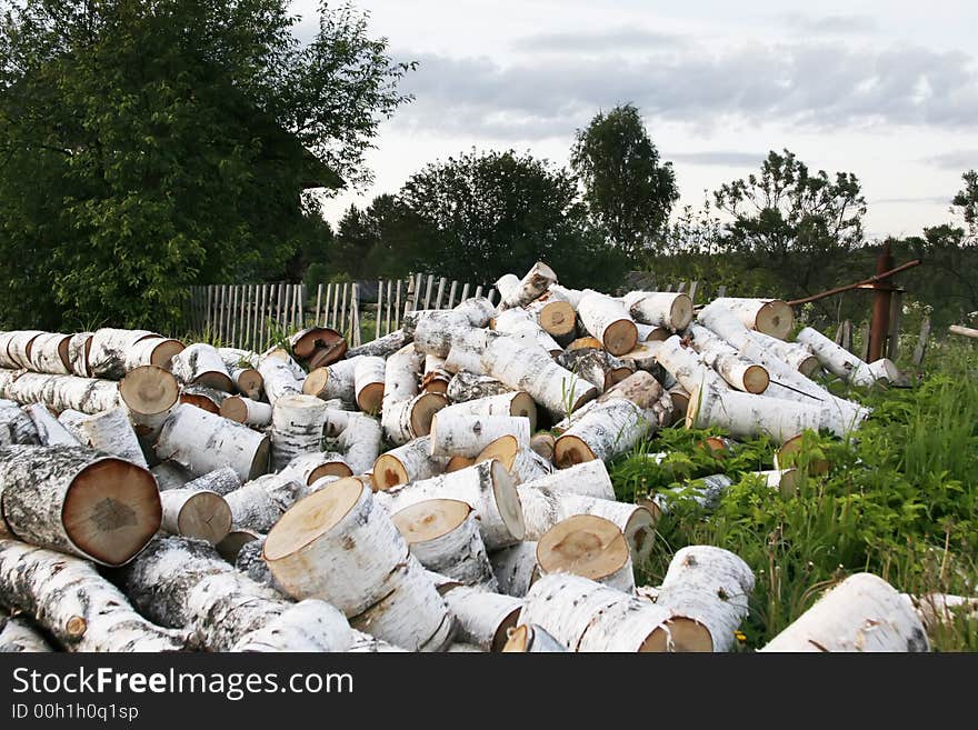 Preparation of fire wood for the winter is one of difficulties of a rural life