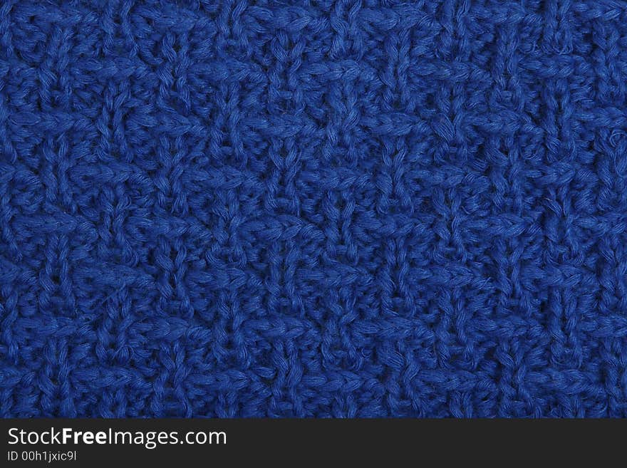 The pattern of a product from a wool in the form of a background. The pattern of a product from a wool in the form of a background