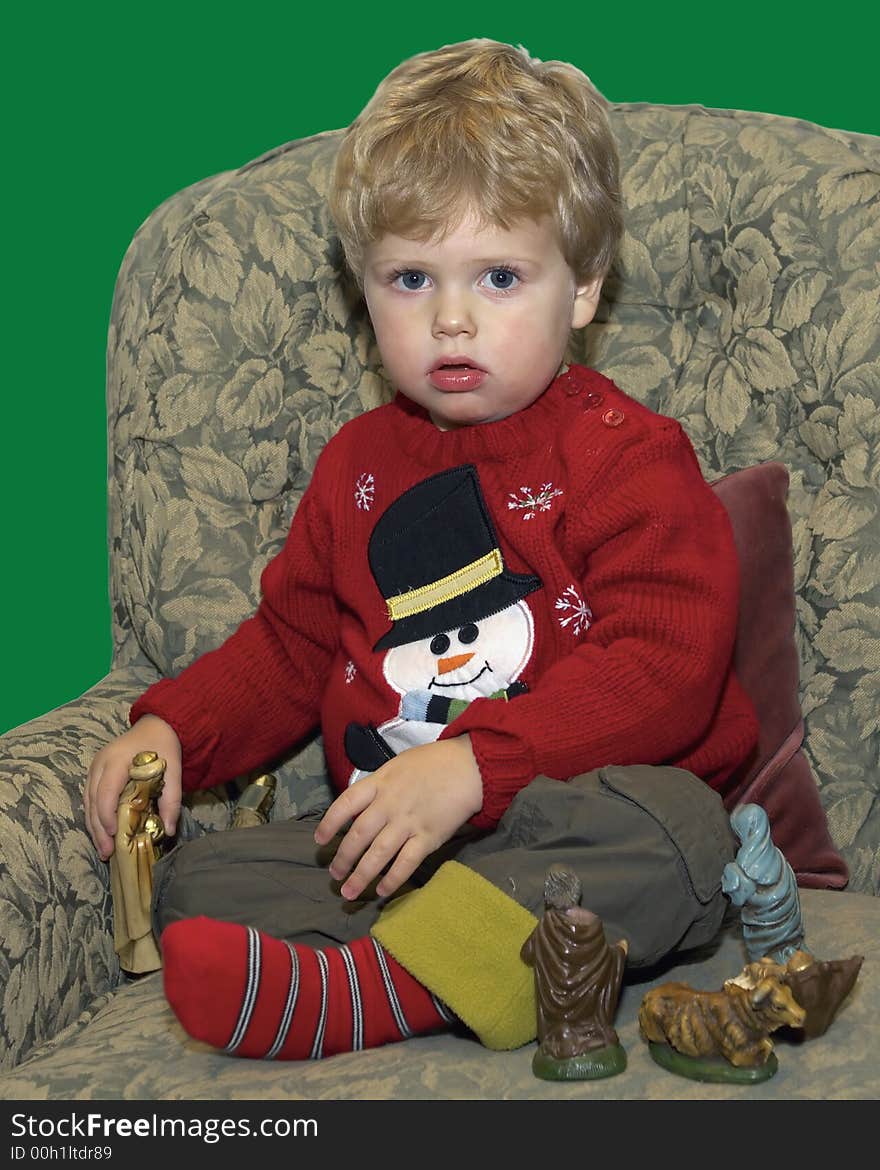 A Young Boy Sitting In a Chair Bored Indoors. A Young Boy Sitting In a Chair Bored Indoors