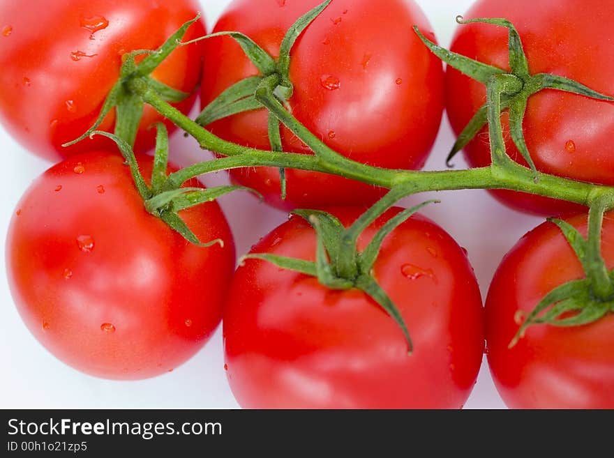 Red ripe tomatoes on white background. Red ripe tomatoes on white background