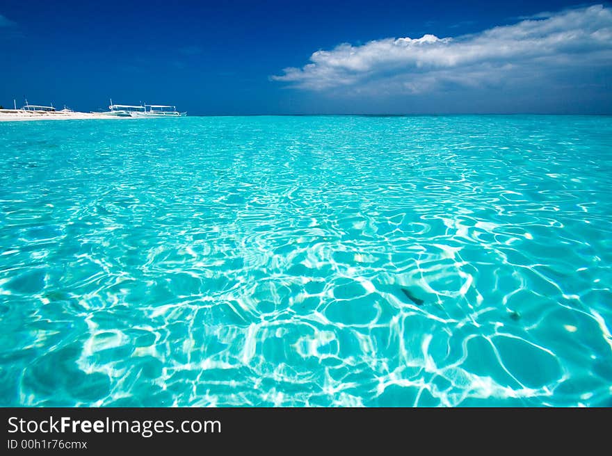 Ocean View of beautiful caribbean blue water beside a secluded white sand beach. Ocean View of beautiful caribbean blue water beside a secluded white sand beach