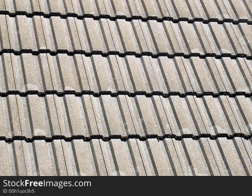 A photo of a roof top tile pattern background. A photo of a roof top tile pattern background.