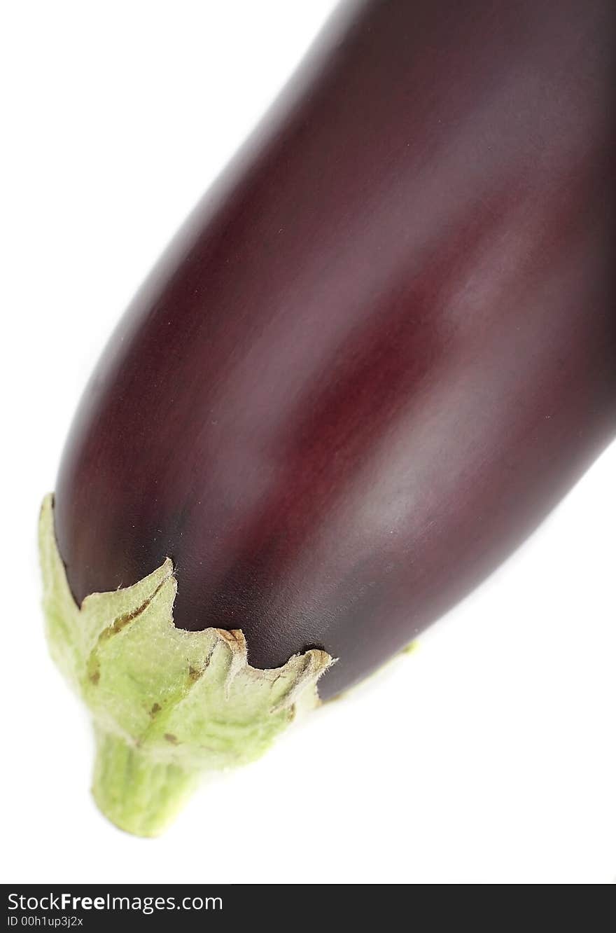 Fresh organic aubergine on white background