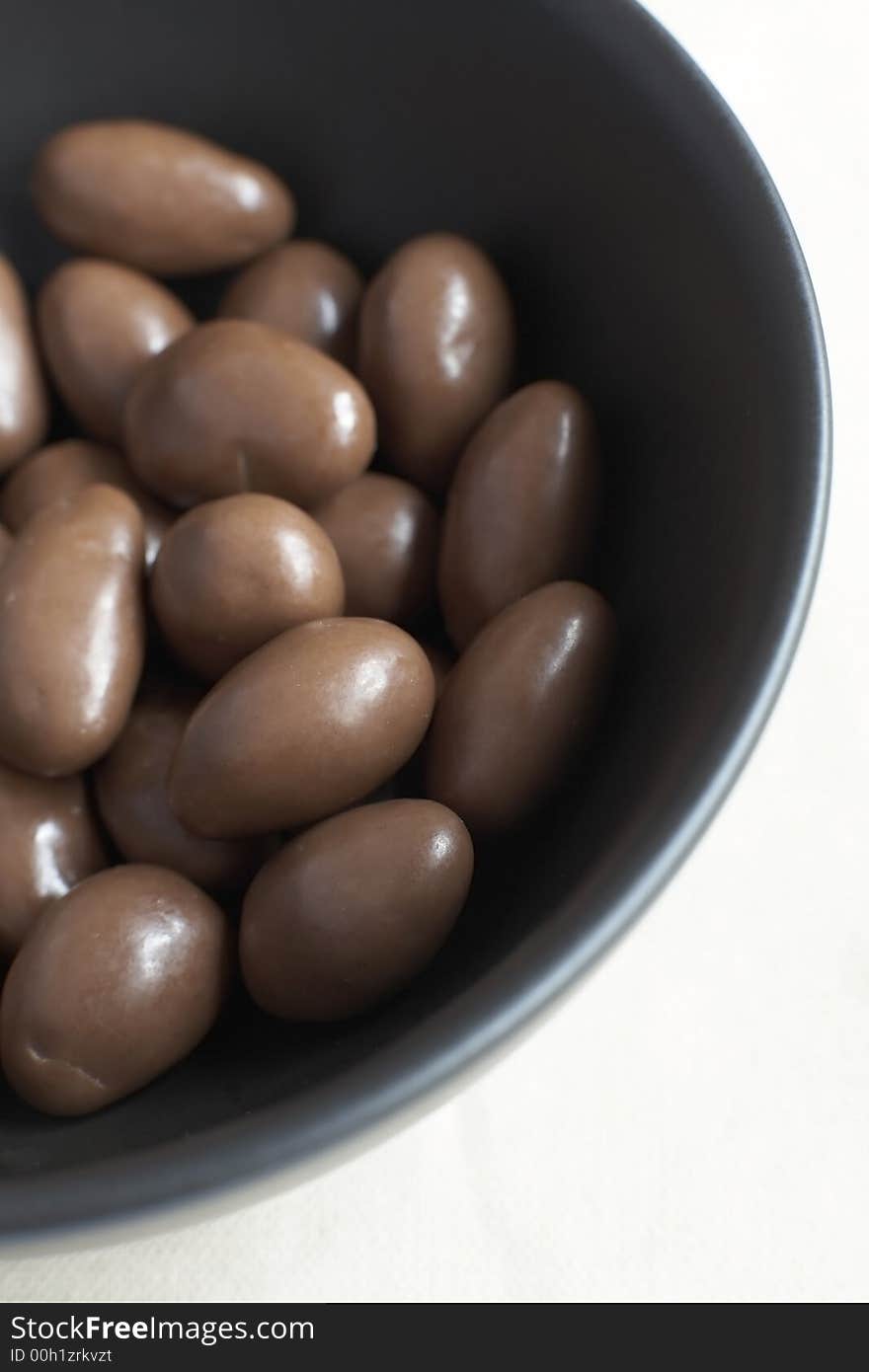 Bowl of chocolate covered nuts. Bowl of chocolate covered nuts