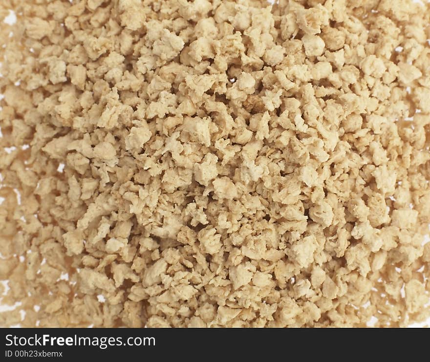 Close up of a dried soya mince on white background. Close up of a dried soya mince on white background