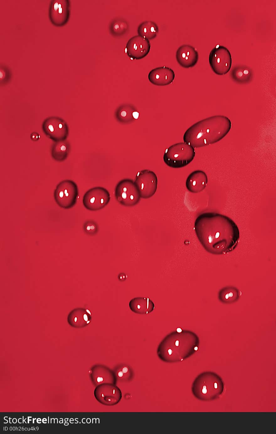 Red Water drops falling away