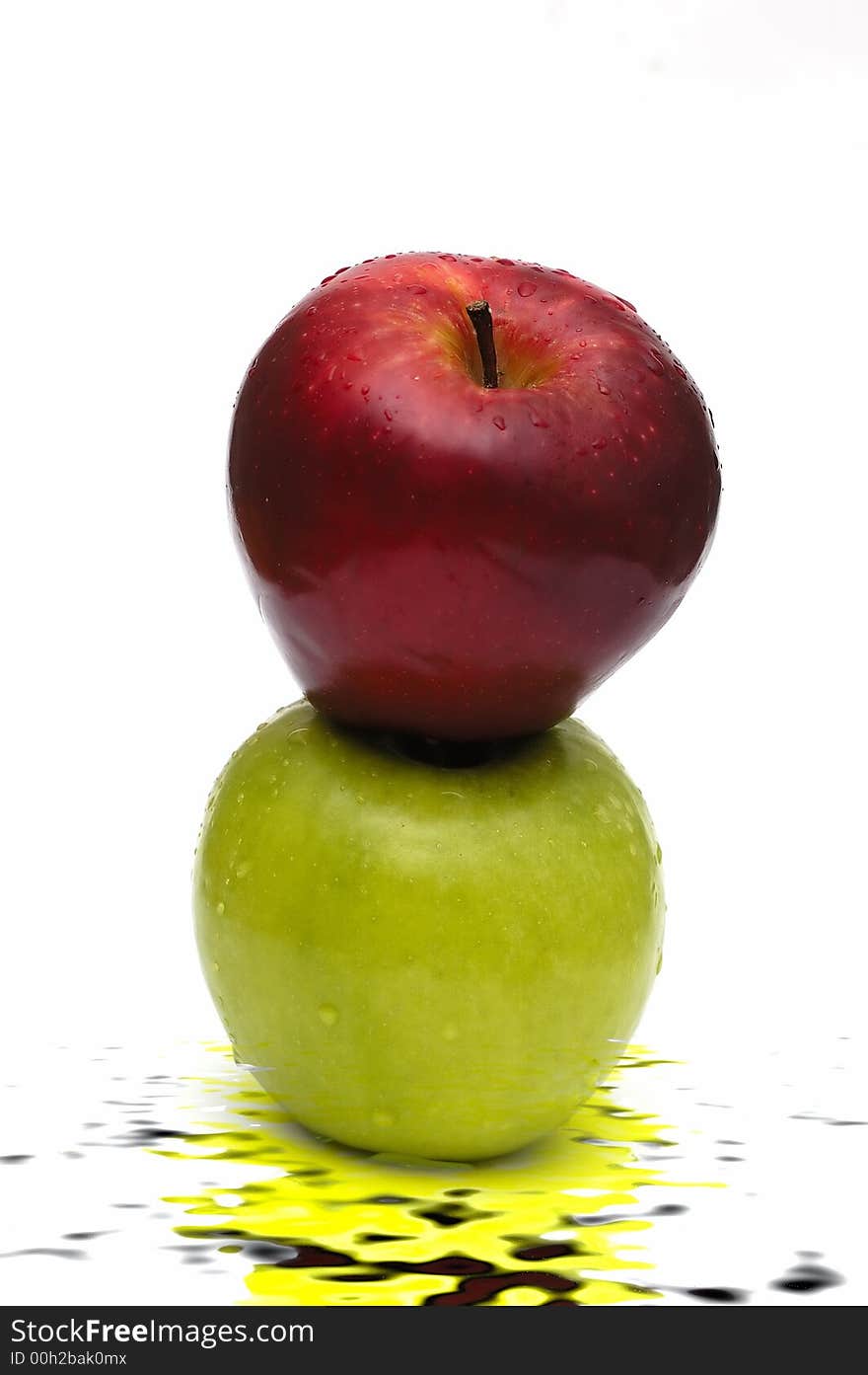 Two apples isolated against a white backgrounds. Two apples isolated against a white backgrounds