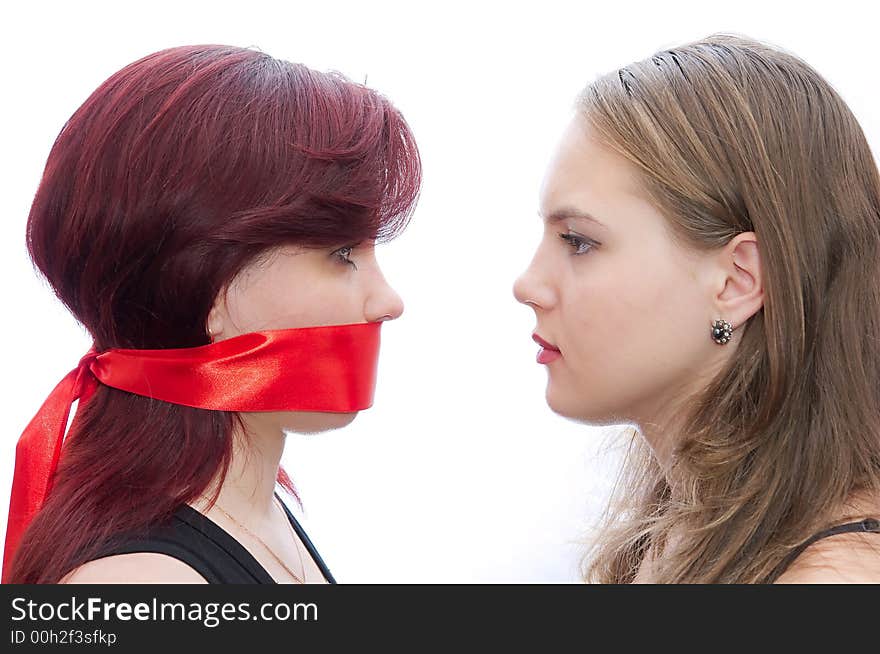 Two girls look against each other