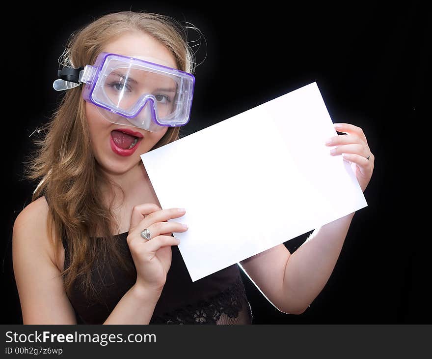 Girl in mask hold a sheet of paper