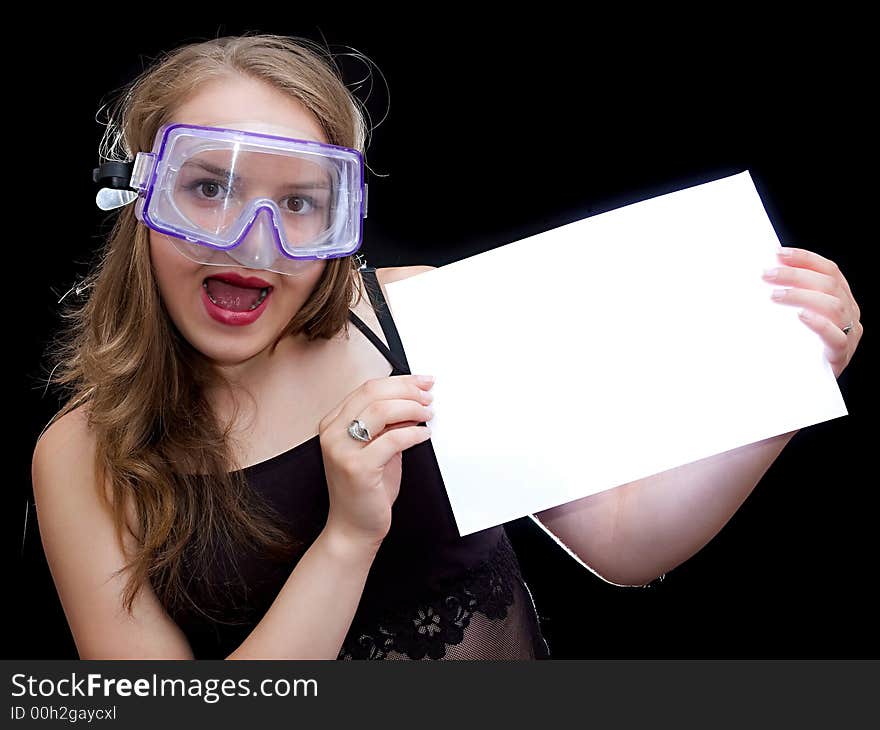 Girl in mask hold a sheet of paper