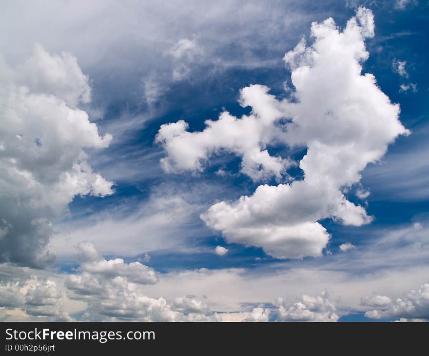 Blue summer sky with bright clouds. horizontal. Blue summer sky with bright clouds. horizontal