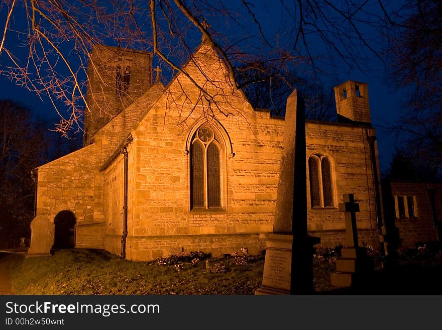 Old English church and graveyard at dusk, Lincolnshire, England. Old English church and graveyard at dusk, Lincolnshire, England.