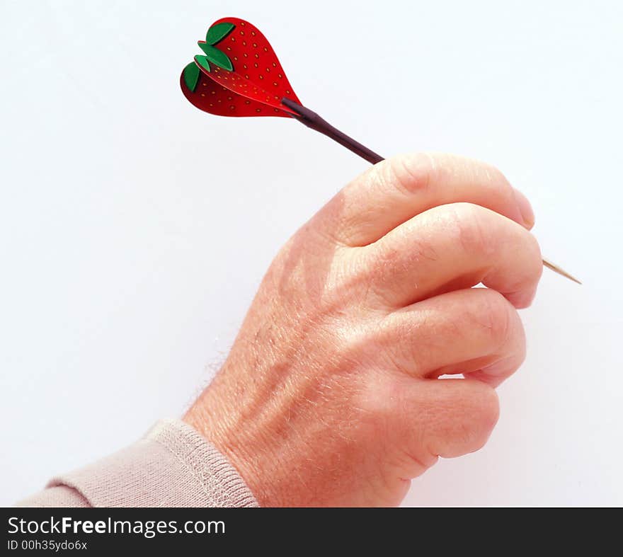 Man throwing a strawberry heart symbol of love. Man throwing a strawberry heart symbol of love