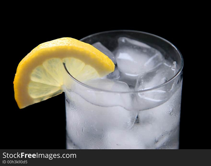 Glass of water with a lemon. Glass of water with a lemon