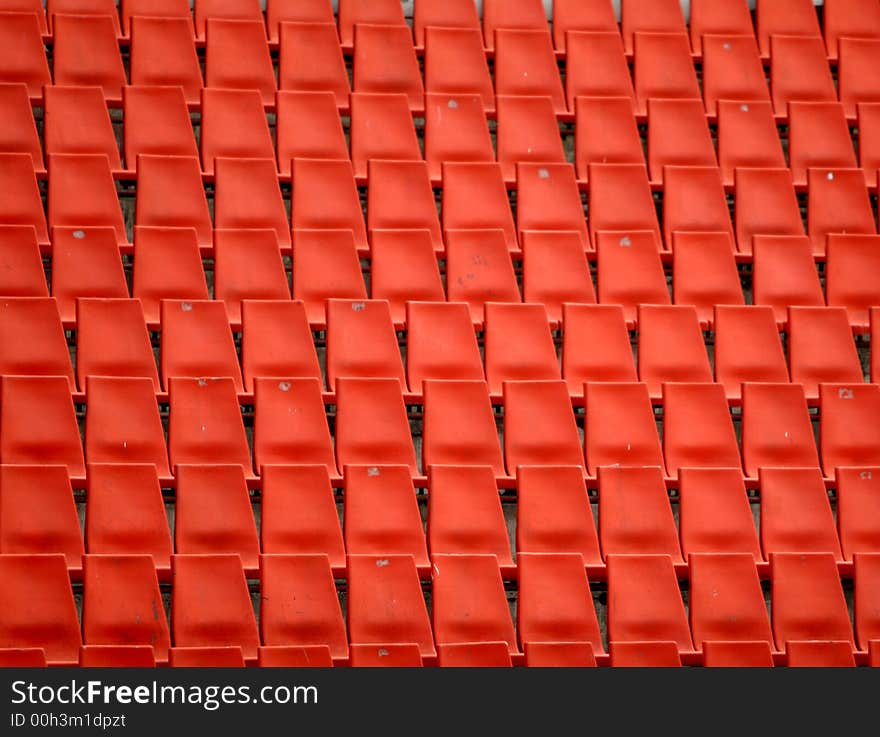 Many many red chairs for the show