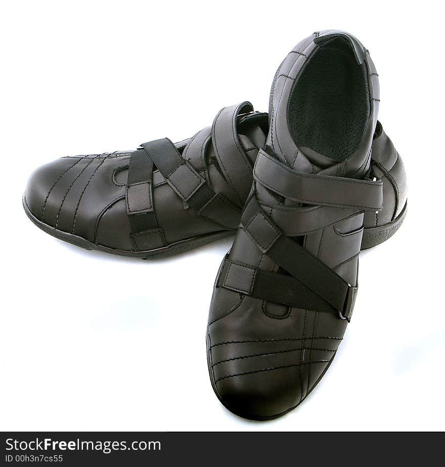 A pair of black man shoes