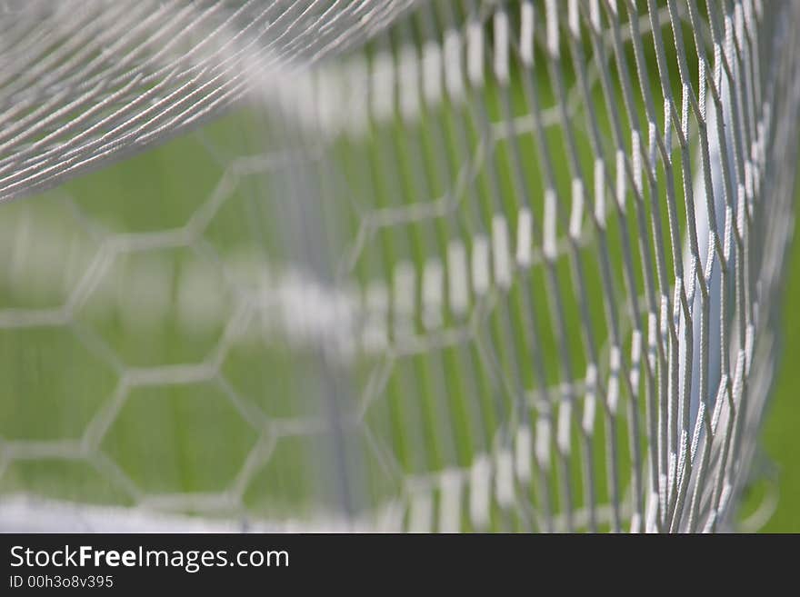 Photo of football net - from the goal. Photo of football net - from the goal