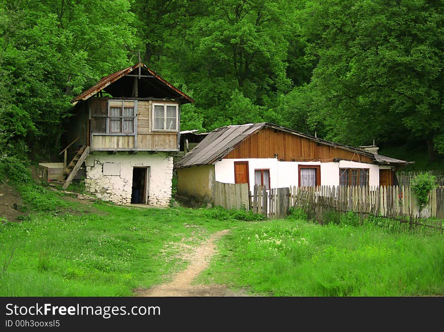 Two little houses in the forest. Two little houses in the forest