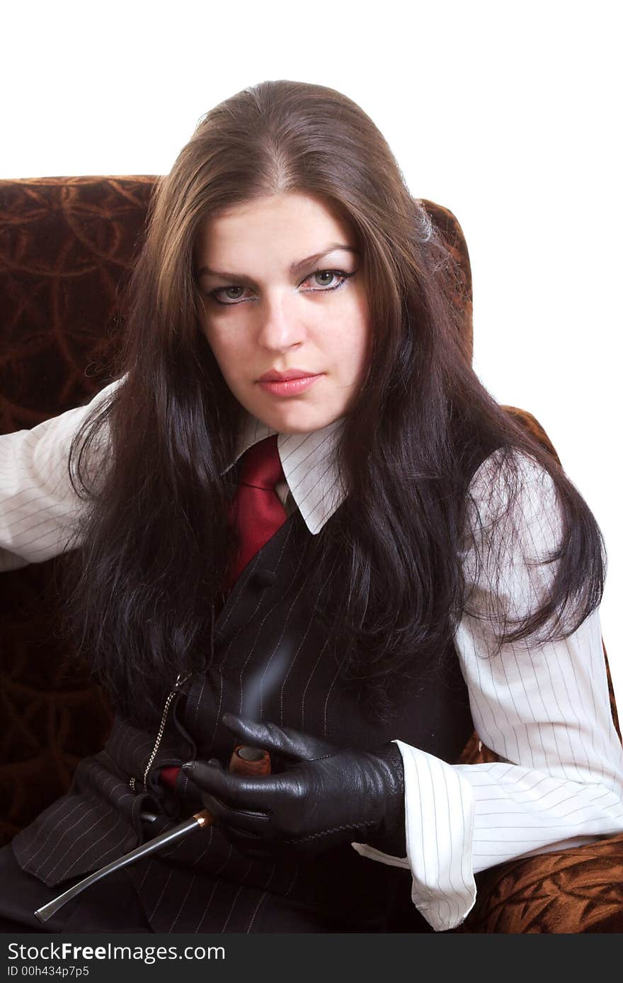 Portrait of the woman with a pipe. Studio shoot