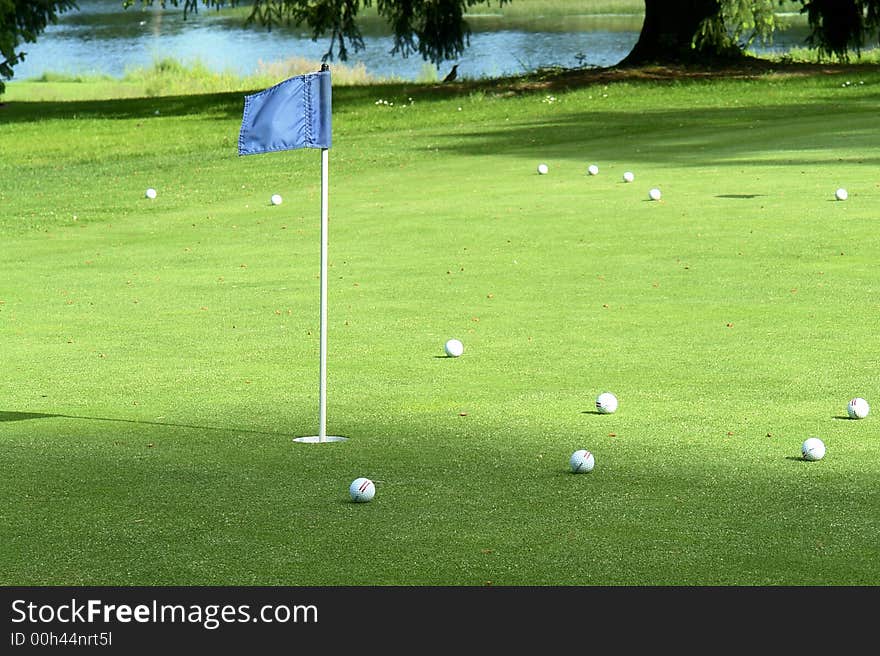 Practise putting green at a country club. Practise putting green at a country club