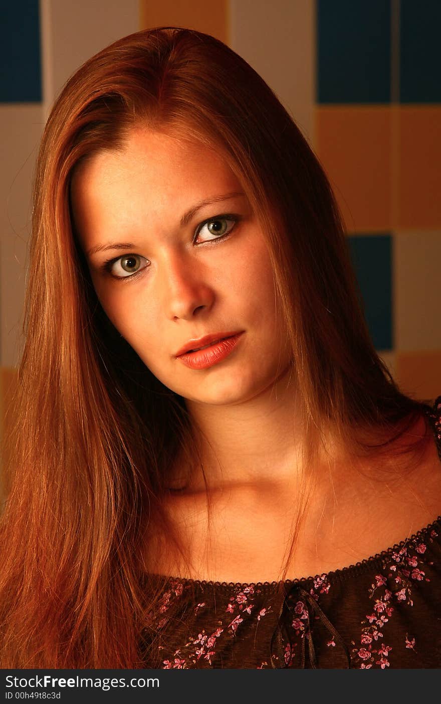 Portrait of the beautiful young woman with long hair and green eyes. Portrait of the beautiful young woman with long hair and green eyes.