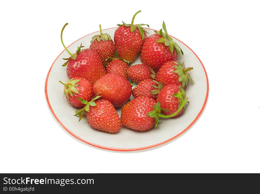 Strawberries on a saucer, isolated on white background, with clipping path in the file. Strawberries on a saucer, isolated on white background, with clipping path in the file