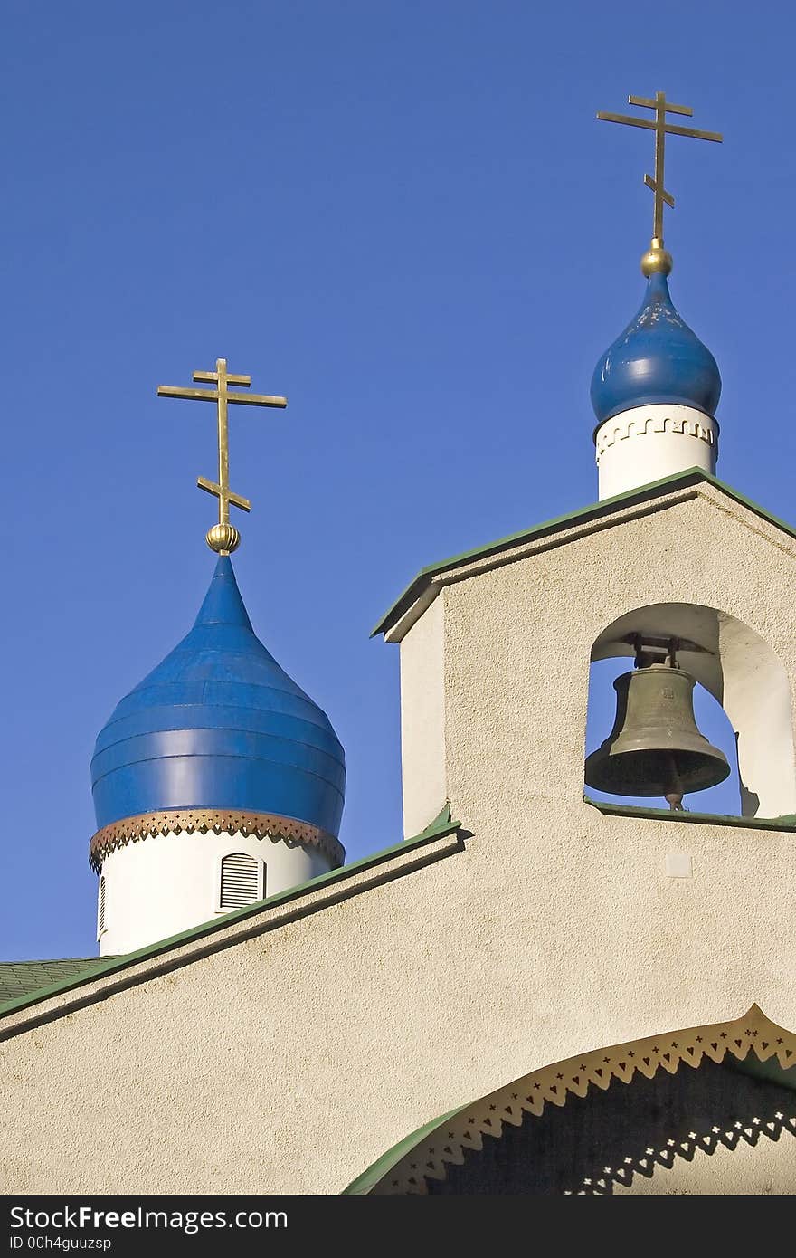 Russian church  with bell and blue towers. Russian church  with bell and blue towers.