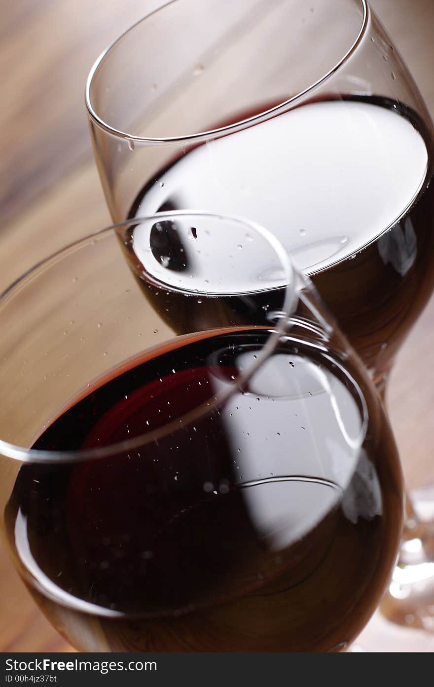 Red wine on wooden table