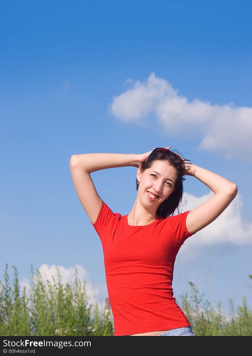 Photo of the young attractive girl with an attractive smile and a happy look. Photo of the young attractive girl with an attractive smile and a happy look.