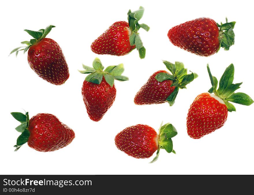 Fresh and tasty strawberries reflected on white background